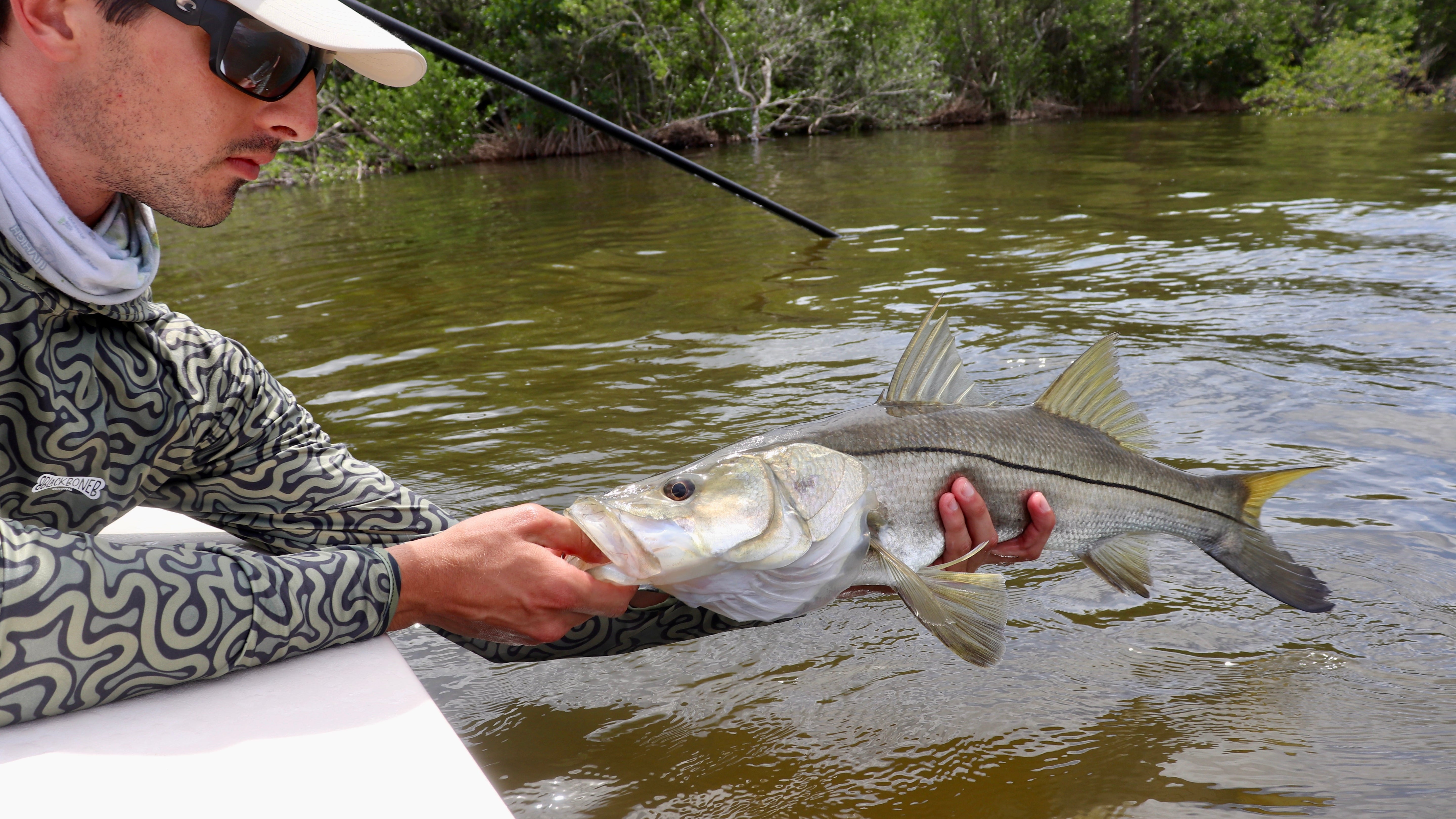 Snook inshore fishing trip targeting trophy snook with Black Bone Outfitters